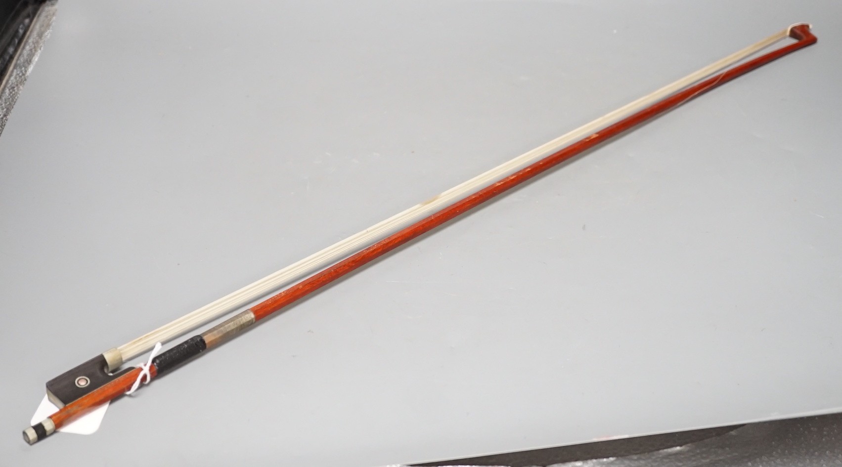 An R. Paesold, Germany violin bow with ivory veneered tip, 74cm